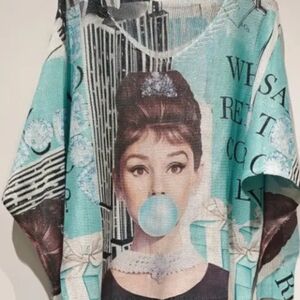 Blue and Black V-Neck Sweater with Artistic Print